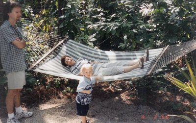 George and Fran's son Ronnie, and grandson Cameron, alongside Fran in the hammock
