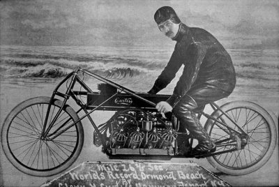 1920s - Glenn Curtiss on motorbike that set the world's record for one-mile speed on Ormond Beach, Florida