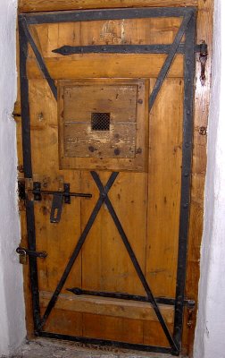 ANCIENT PRISON CELL DOOR