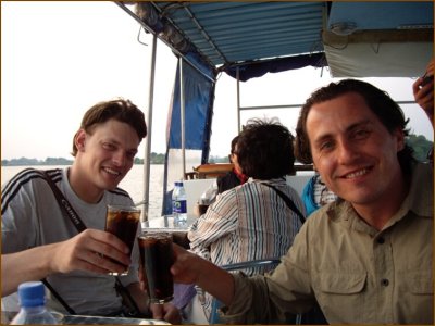 After the helicopter ride we went for a sunset cruise in the river. Francis and Jens are about to enjoy their rum with coke.