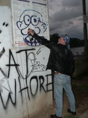 Charlie doing his bit for Australian graffiti