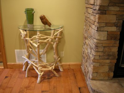 Accent table between foyer and living room