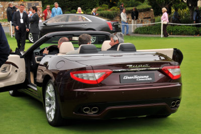 2011 Maserati GranTurismo Convertible, with Cadillac XTS Platinum Concept in the background. (CR)