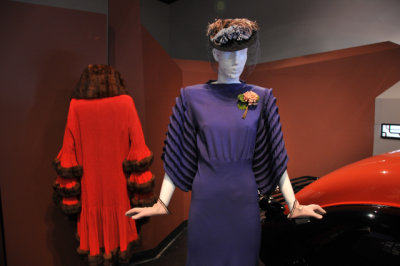 From left, Paquin evening coat, 1930-1, silk chiffon with fur trim; dress, 1935-6, rayon crepe