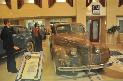 1939 Oldsmobile Series 70 Business Coupe from the collection of Bud Dutton; photographed through glass window