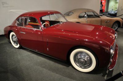Aluminum bodied 1947 Cisitalia 202 Coupe by Pinin Farina, from Petersen Collection, with cheaper fiberglass copy in background