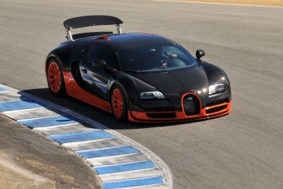 A 2011 Bugatti Veyron 16.4 Super Sport, with 1200 hp, set the production-car land speed record of 268 mph, in 2010. (CR)