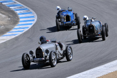 No. 51, Hubert Jaunin, 1933 Bugatti Type 51; an unknown Bugatti; and No. 171, Konig Jurg, 1926 Bugatti Type 37A (3201)