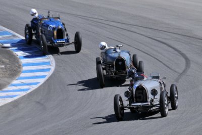 No. 51, Hubert Jaunin, 1933 Bugatti Type 51; an unknown Bugatti; and No. 171, Konig Jurg, 1926 Bugatti Type 37A (3241)