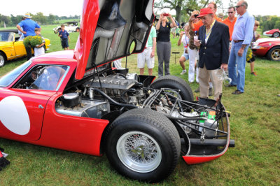 Fred Simeone, with red cap, looks at 1965 Ferrari 250 LM, owned by his friend Luigi Chinetti, Jr. (5835)