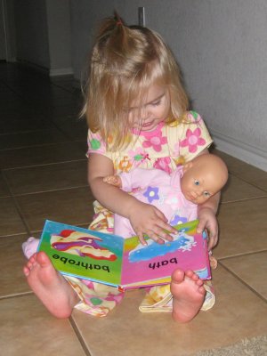 Reading to Her Baby