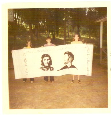 Campers W Strell, R Itzkowitz and L Brown display Cuban Revolution Banner 1968.jpg