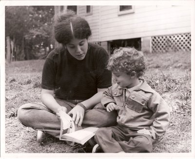 Counsler Janie Schreiber reads to toddler 1968.jpg
