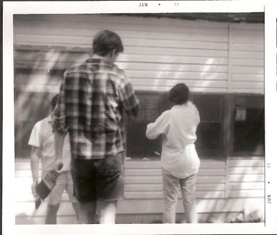 Memorial Day weekend 1969 staff and alumni help with clean-up.jpg