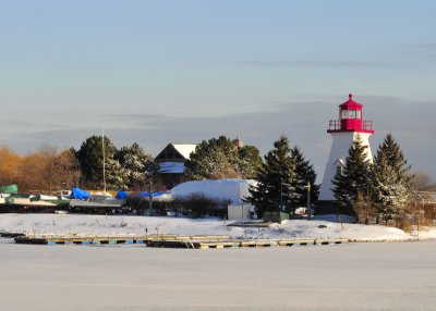 Lighthouse and Ice in the Harbour