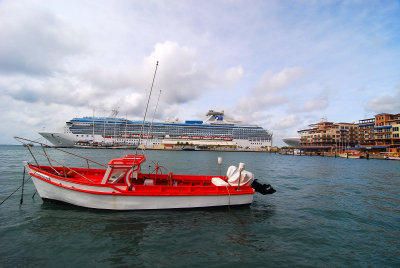 Aruba - Island Princess  and bow of Emerald Princess in background