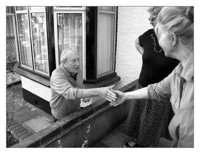 Mum shakes hands with aunt's neighbour