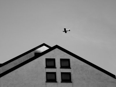 Urban landscape with airplane