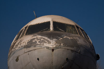 damaged cockpit windows