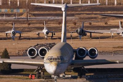 IL-62 with some fighters behind her