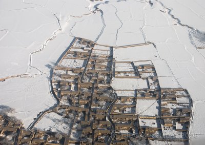Little houses in the winterlandscape