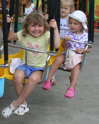 ella and audrey on swings