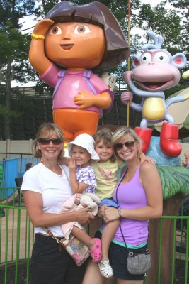 kimberley, audrey, ella, and alex with dora and boots