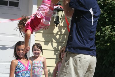 keith giving audrey a lift into the pool