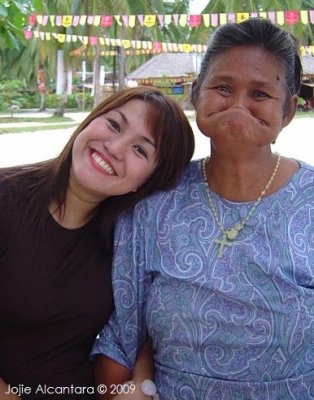 She is the resident madwoman of Siargao Island. I liked her a lot. She used to chase after men and try to grab their balls. 