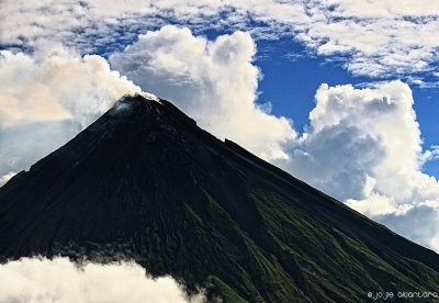 Mayon's blackened crater tip