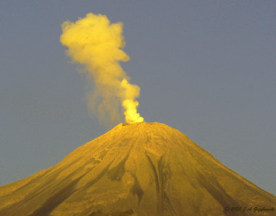 Volcan de Colima smoking near dusk
