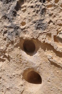 Ggantija temple in Gozo - holes to allow passage of liquid offerings 