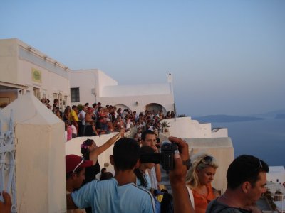 People Admiring Santorini Sunset.jpg