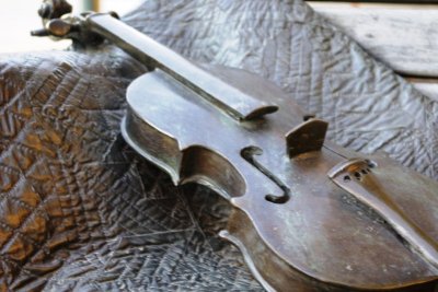 Appalachian Stage - Bronze Fiddle on Quilt.jpg
