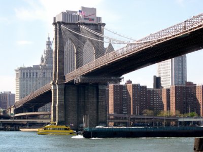 The Brooklyn Bridge and Manhattan as seen from the Fulton Ferry Landing Pier in Brooklyn.