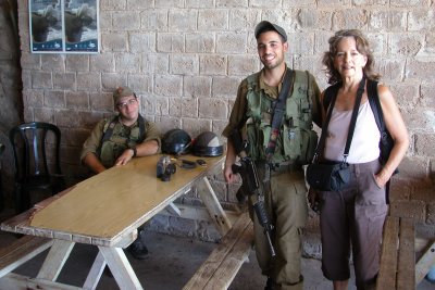 Rosh Hanikra: Judy with two Israeli soldiers in a tunnel built by the British during WWII - at the Lebanese border.