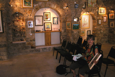 Judy holding a print we purchased in this shop in the Artists Quarter in Tzfat.