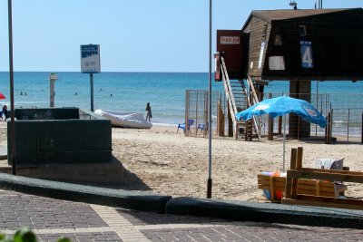 Judy  next to the Mediterranean Sea on Camel Beach in Haifa.