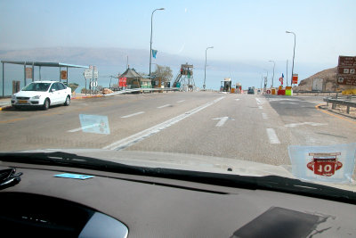 Driving south through a military checkpoint on our way to Masada. The West Bank is nearby.