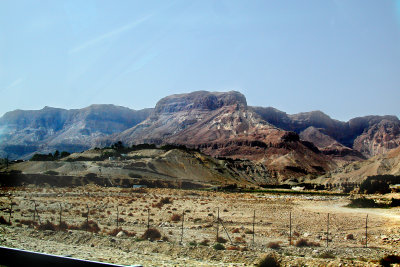 This mountain/cliff is Masada. Masada is near the southwestern coast of the Dead Sea, in the Judean Desert.
