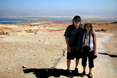 Judy and Richard on top of Masada with the Dead Sea and mountains in Jordan in the background.