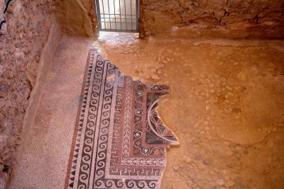 Floor mosaic in King Herods Western Palace (30 b.c.e.): Mosaics of pomegranates, fig leaves & geometrical pattern of circles.
