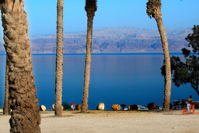 The public beach at the Dead Sea in Ein Gedi. Mountains in Jordan are in the background.
