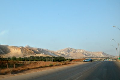 Approaching a military checkpoint before entering the West Bank. Another military checkpoint to enter Jordan is nearby