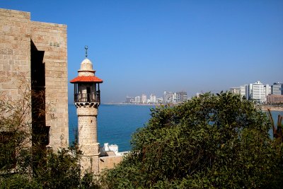 Minaret of the Al-Bahr Mosque in Jaffa - Mediterranean Sea and skyline of Tel Aviv are in the background.