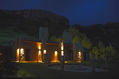 View of boma and cottage at night