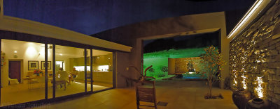 View of interior courtyard and living area at night