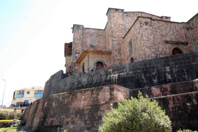 The Perfect Masonry of the Curved Inca Wall Next to the Baroque Church