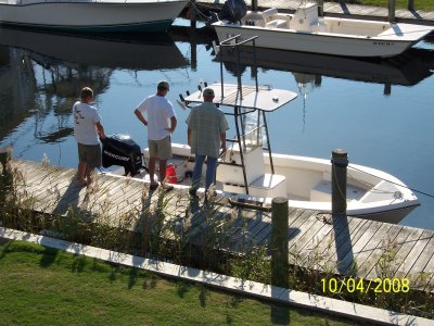 Davis, Bill, John & John's boat