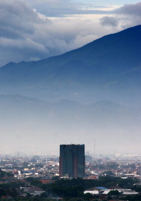 Building with layers of mountains